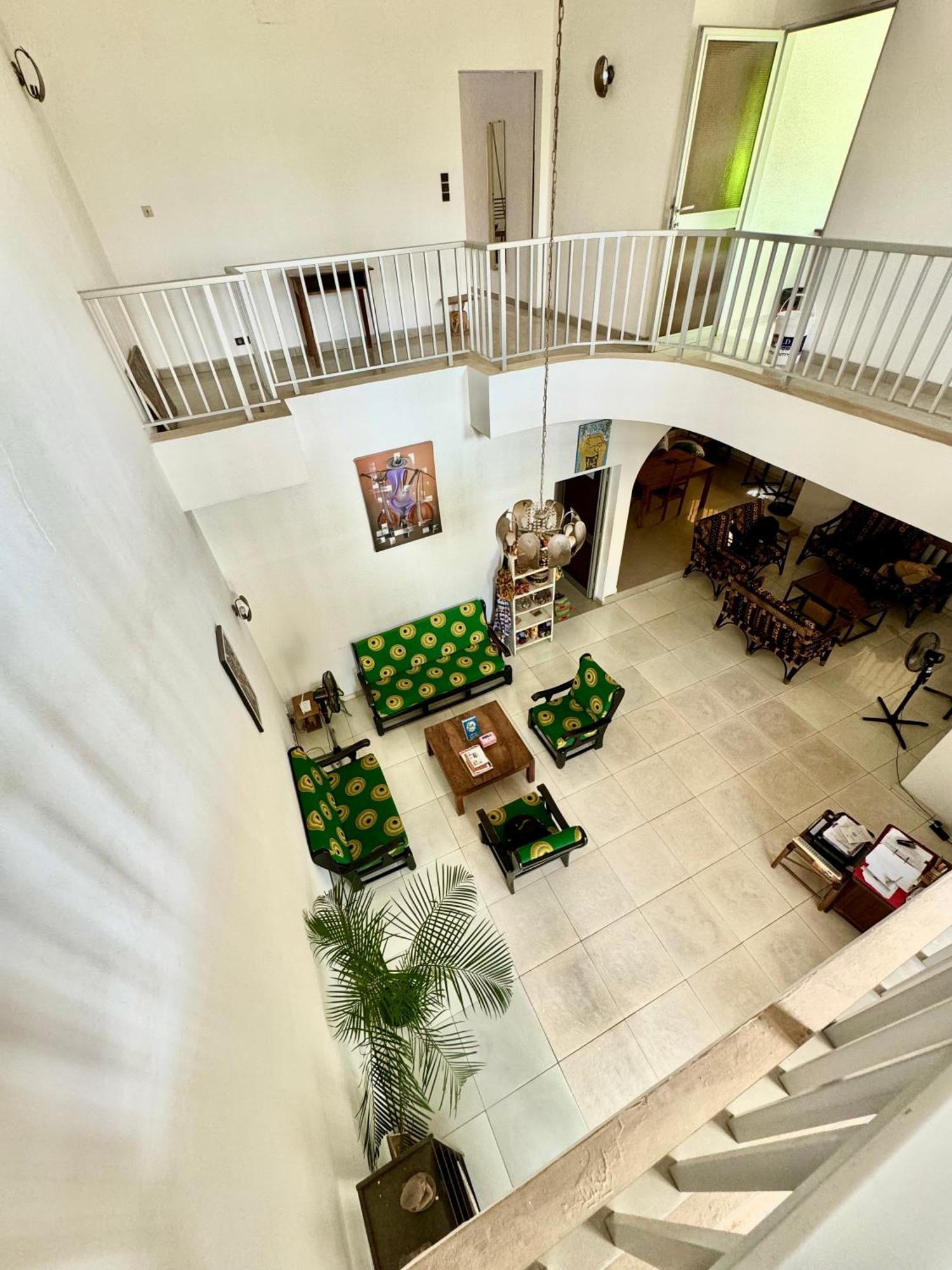 Guesthouse Cocotiers Котону Экстерьер фото