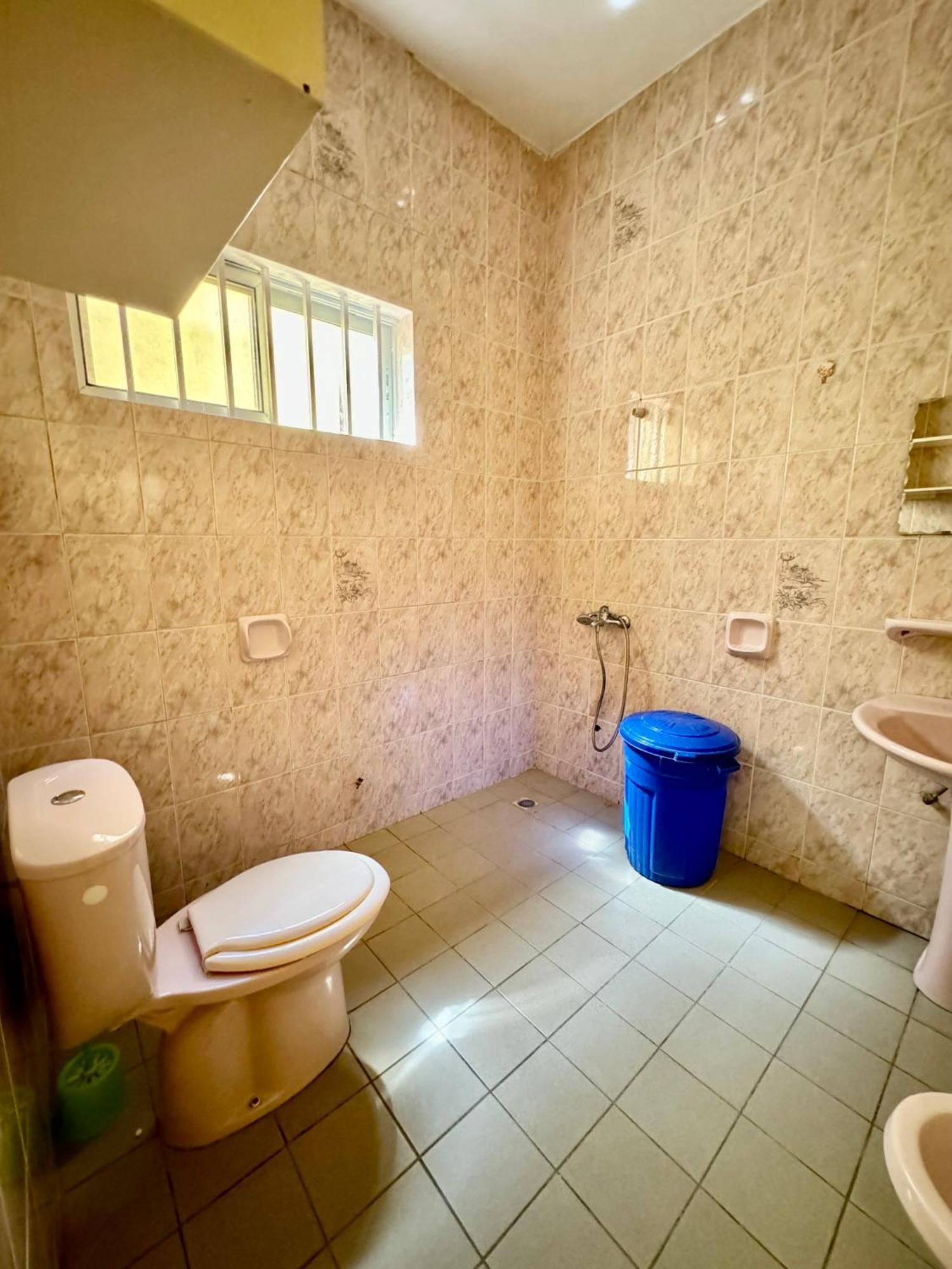 Guesthouse Cocotiers Котону Экстерьер фото