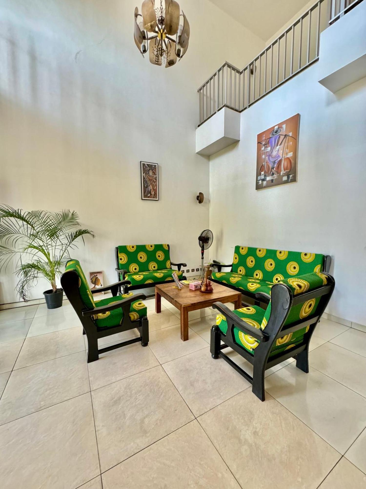 Guesthouse Cocotiers Котону Экстерьер фото